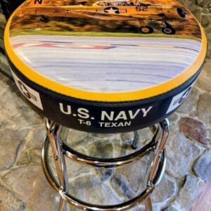 Round chrome stool topped with yellow T-6 photo