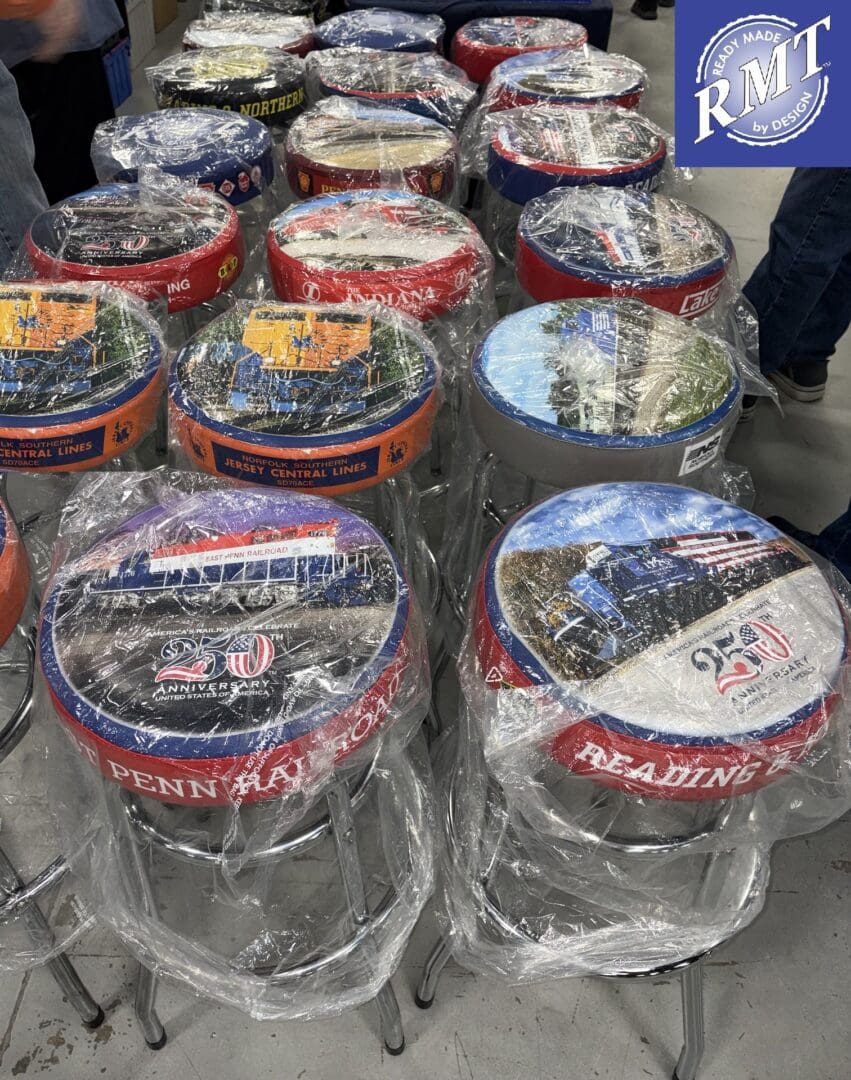 Rows of wrapped railroad themed bar stools