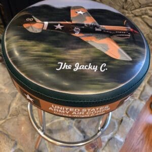 Round stool with shark-mouth wartime airplane design
