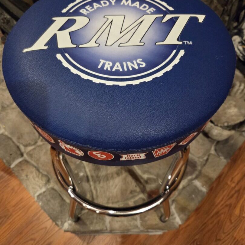 Blue barstool with RMT Trains logo